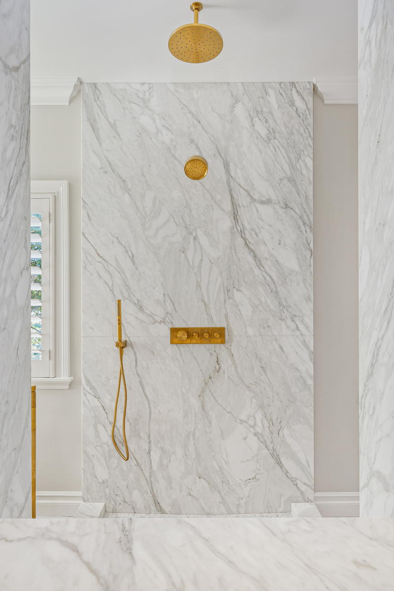 Custom walk-in shower in a La Costa home remodel in Carlsbad featuring modern tile, glass enclosure, and spa-style design.