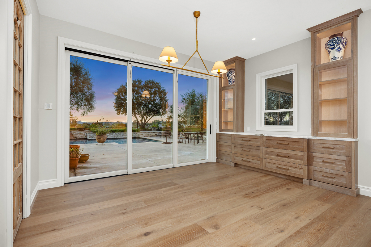 Modern custom cabinets in a La Costa home remodel in Carlsbad featuring sleek design, built-in storage, and premium finishes.